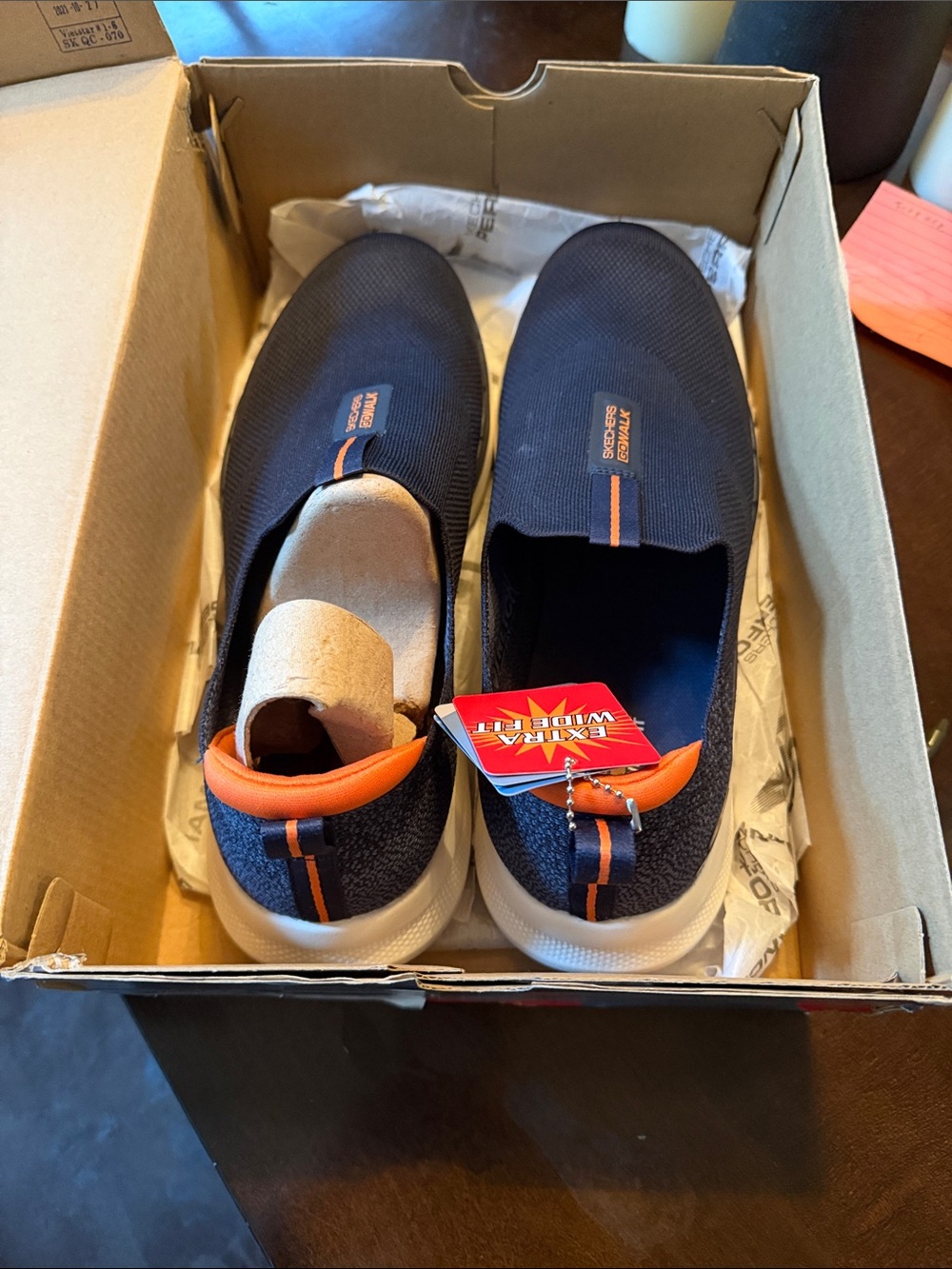 Skechers Men’s Slip-On Sneakers in Navy and Orange